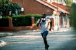 © Geber86 - Active young black man jogging on the street