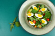 Dietary salad with nettles and egg.