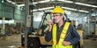 © BESTIMAGE - man engineer technician worker talk call by use mobile radio walkie talkie communicate speak to service technician. worker in uniform helmet safety and inspection check control old machine in factory