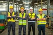 © BESTIMAGE - Group of colleague Engineer team join stack hand together with Spirit diversity solidarity power team in factory. foreman Join hand show oneness unity together teamwork friendship empower.