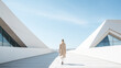Modern fashion concept stylish woman against white minimalism design architecture building