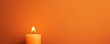 Orange background with white thin wax candle with a small lit flame for funeral grief death dead sad emotion with copy space texture for display 