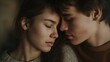 © Nick - Couple faces each other head against head eye closed nose against nose Caucasian male and female hugging