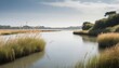 A tranquil estuary with reeds swaying gently in th upscaled 2