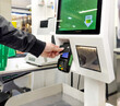 © lado2016 - Customer pays his purchase at the supermarket,self checkout systems in  retail stores,Barcode scanner,Self checkout machine