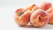 white peaches on clean isolated background the image shows a single white peach on a clean white surface, with no other objects visible in the frame