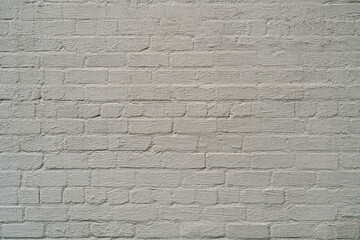 Wall Mural - The brick wall is painted with white paint. Abstract construction background.