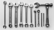 A collection of tools including wrenches and pliers