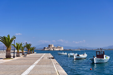 Poster - Small fishing boats and Bourtzi fortress in Nafplio, Peloponnese, Greece