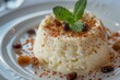 Delectable Creamy Rice Pudding Garnished with Mint and Cinnamon