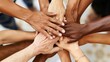 © Sunijsa - A group of people are holding hands in a circle