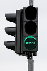 Wall Mural - brand concept. traffic light with green light and word