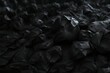 © Rayan Heaven - Black texture crumpled embossed background.Texture paper old black style vintage cardboard sheet of empty dark background. Wallpaper background
