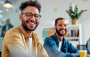 Happy teammates in a modern office, working together at a tech startup, coding, marketers, professionals. Corporate employees, team, bonding. Men, man, Hispanic, diversity