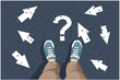man in sneakerss standing on asphalt next to multitude of arrows in different directions and question mark, confusion choice chaos concept, Flat vector.
