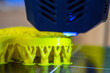3D printer printing object close-up. Process creating three-dimensional model on 3d printer. Additive printer technology. 3D Prototyping. 3D design modeling. New modern innovation printing technology