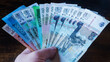 Assorted Russian Ruble Banknotes in Hand