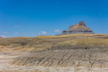 Wall Mural - Beautiful desert landscape with Factory Butte in background.