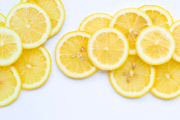 Wall Mural - Fresh lemon slices isolated on white