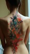 Artistry on skin: creative and beautiful tattoo adorning the back of a woman's body, a masterpiece of personal expression and aesthetic allure, celebrating the beauty of individuality