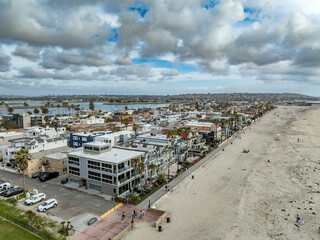 Wall Mural - Aerial view of beach house properties for rental on Mission Beach San Diego California with cloudy sky