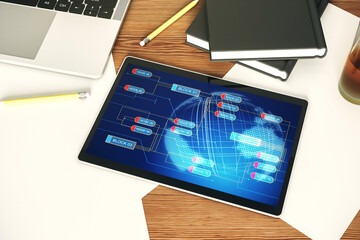Wall Mural - top view of modern digital tablet screen with abstract creative programming illustration and world m