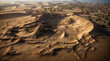 Aerial view of intricate sand formations in a vast desert