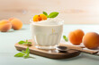 White yogurt with fresh apricot fruits
