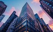© Milan - The crisp blue sky reflected in a towering glass skyscraper captured from a low angle perspective. copy space for text.
