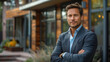 © steve - Portrait of successful male in business suit, arms crossed, confident expression. Modern office building in background. Room for copy space.