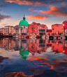San Simeone Piccolo church and colorful buildings reflected in the calm waters of Mediterranean sea. Fantastic morning cityscape of Venice, Italy, Europe. Travel the world..