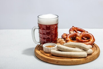 Wall Mural - Traditional Oktoberfest set. Pretzels, beer, weisswurst with mustard. German festival food concept