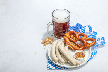 Wall Mural - Traditional Oktoberfest set. Pretzels, beer, weisswurst with mustard. German festival food concept