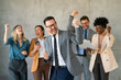 Excited overjoyed diverse business people, team celebrate corporate victory together in office