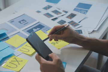 ux Graphic designer creative sketch planning application process development prototype wireframe for web mobile phone . User experience concept.