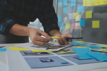 ux Graphic designer creative sketch planning application process development prototype wireframe for web mobile phone . User experience concept.