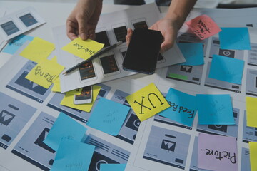 ux Graphic designer creative sketch planning application process development prototype wireframe for web mobile phone . User experience concept.