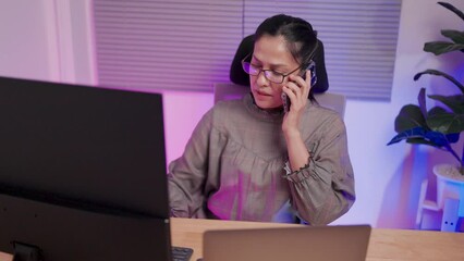 Close-up of a female software developer trying to solve a computer problem where hackers stole important items and lost them. One woman immediately called the protection team.