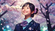 桜吹雪の中の女子生徒　入学・卒業イメージ