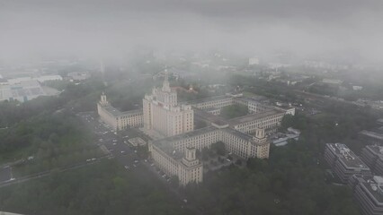 Wall Mural - Bucharest from above. Aerial 4K video during a foggy morning in north part of Bucharest, view to Free Press House (Casa Presei Libere in Romanian) and office skyscraper buildings in Romania.