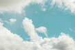© ADDICTIVE STOCK - Serene blue sky with fluffy white clouds