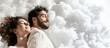 © MYDAYcontent - A man and a woman laying in a relaxed position on a cloud made of cotton.