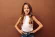 © Santiago - Smiling kid girl in casual outfit