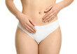 © New Africa - Gynecology. Woman in underwear on white background, closeup