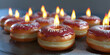 Candles in the church candles on the table, Burning sweet donut doughnut on fire Hot baked roll in flames junk food burning calories weight loss. 