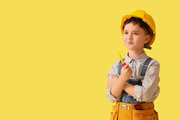 Sticker - Cute little builder with toy screwdriver on yellow background