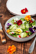 Salad of vegetables and flowers.