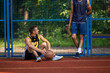 Men having basketball workout on hot sunny day