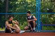 Basketball players have training outdoor playing together
