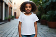 African American girl with curly hair in white T-shirt mockup. Abstract image of child for fashion design presentation
